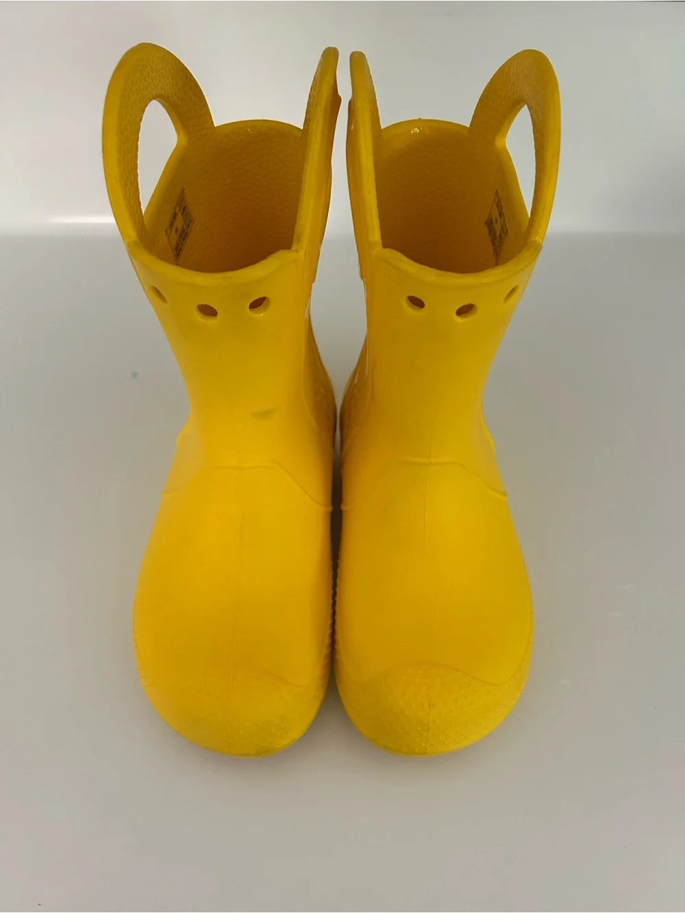 CROCS yellow rain